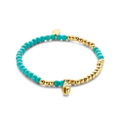 Kralenarmband met turkooizen kralen en schelpbedel