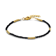 Kralenarmband met zwarte en gouden kralen