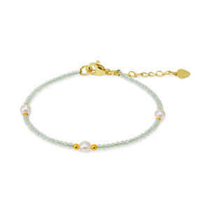Kralenarmband toermalijn en schelpparels