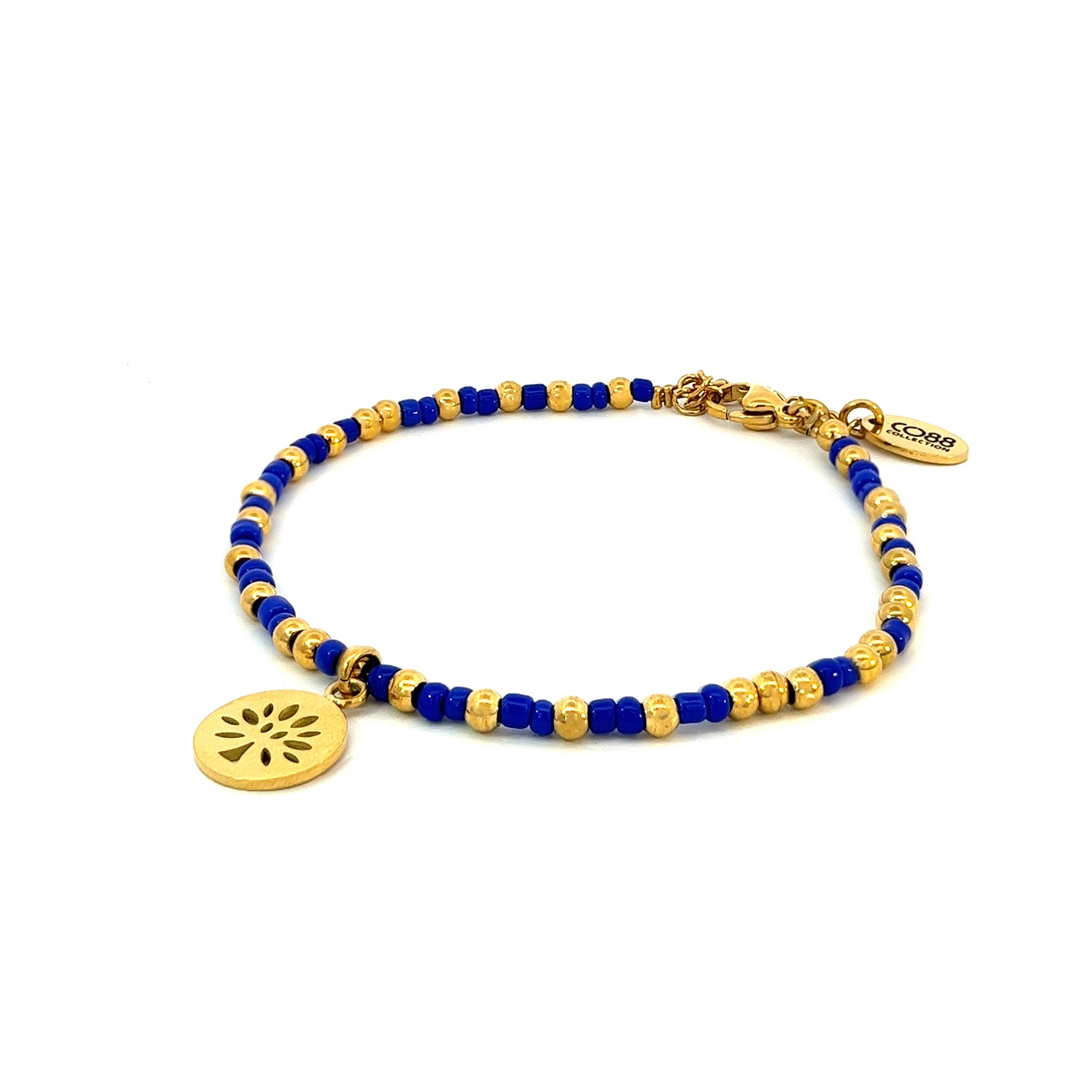 Kralenarmband met paarse kralen en boombedel