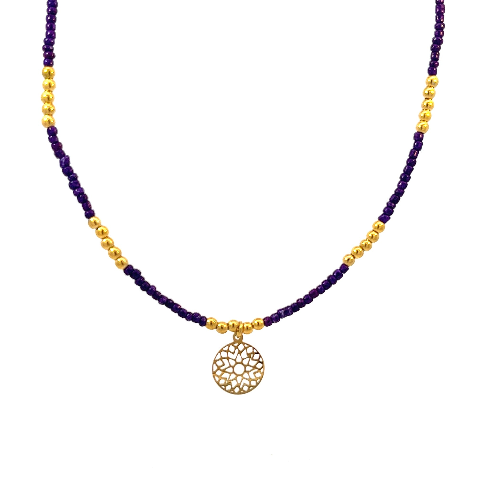 Ketting met paarse kralen en bedel