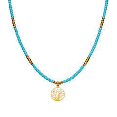 Ketting met turquoise kralen en levensboom bedel