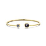 Gold plated open bangle with two blue round stones
